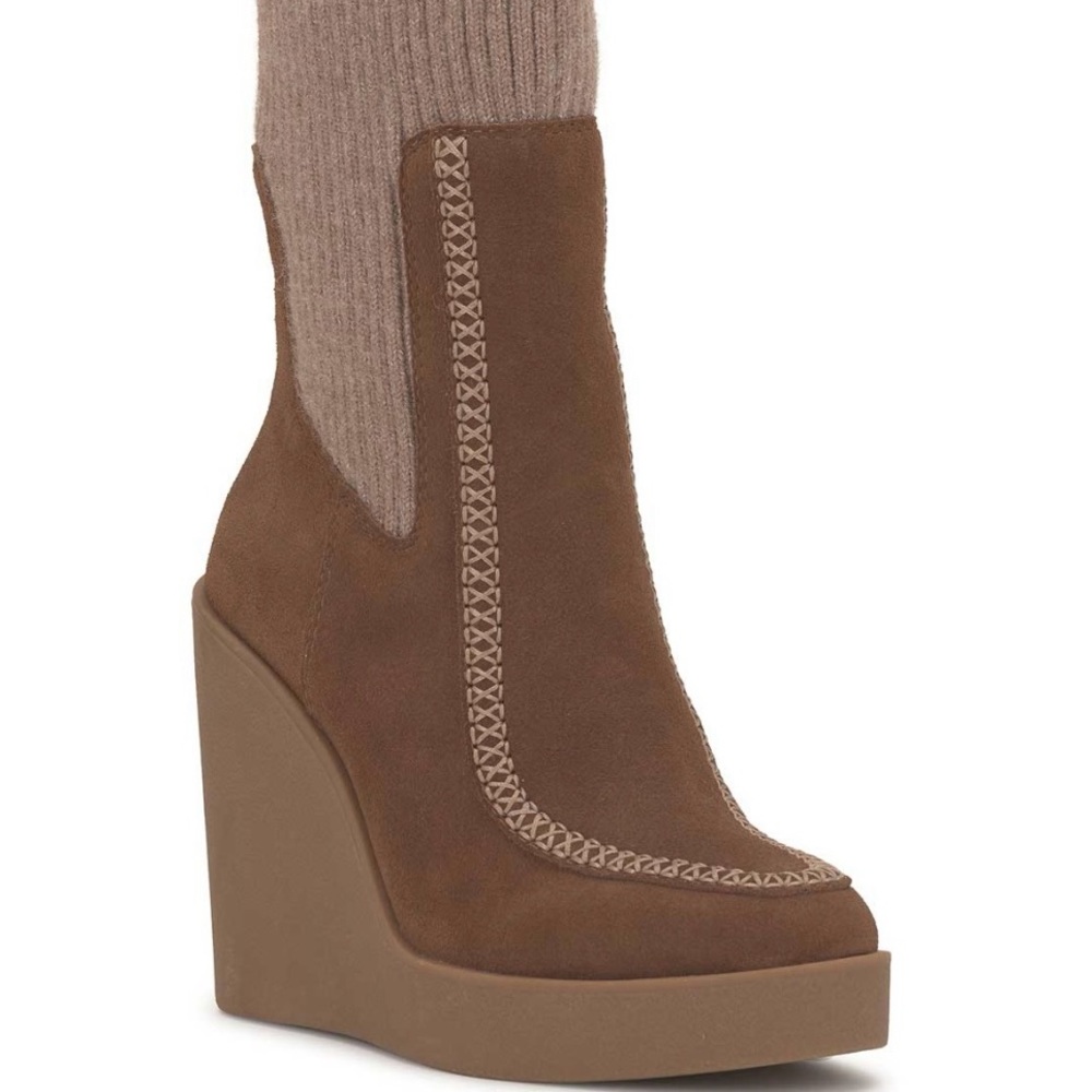 Jessica Simpson boots. New never used, they run a little big.